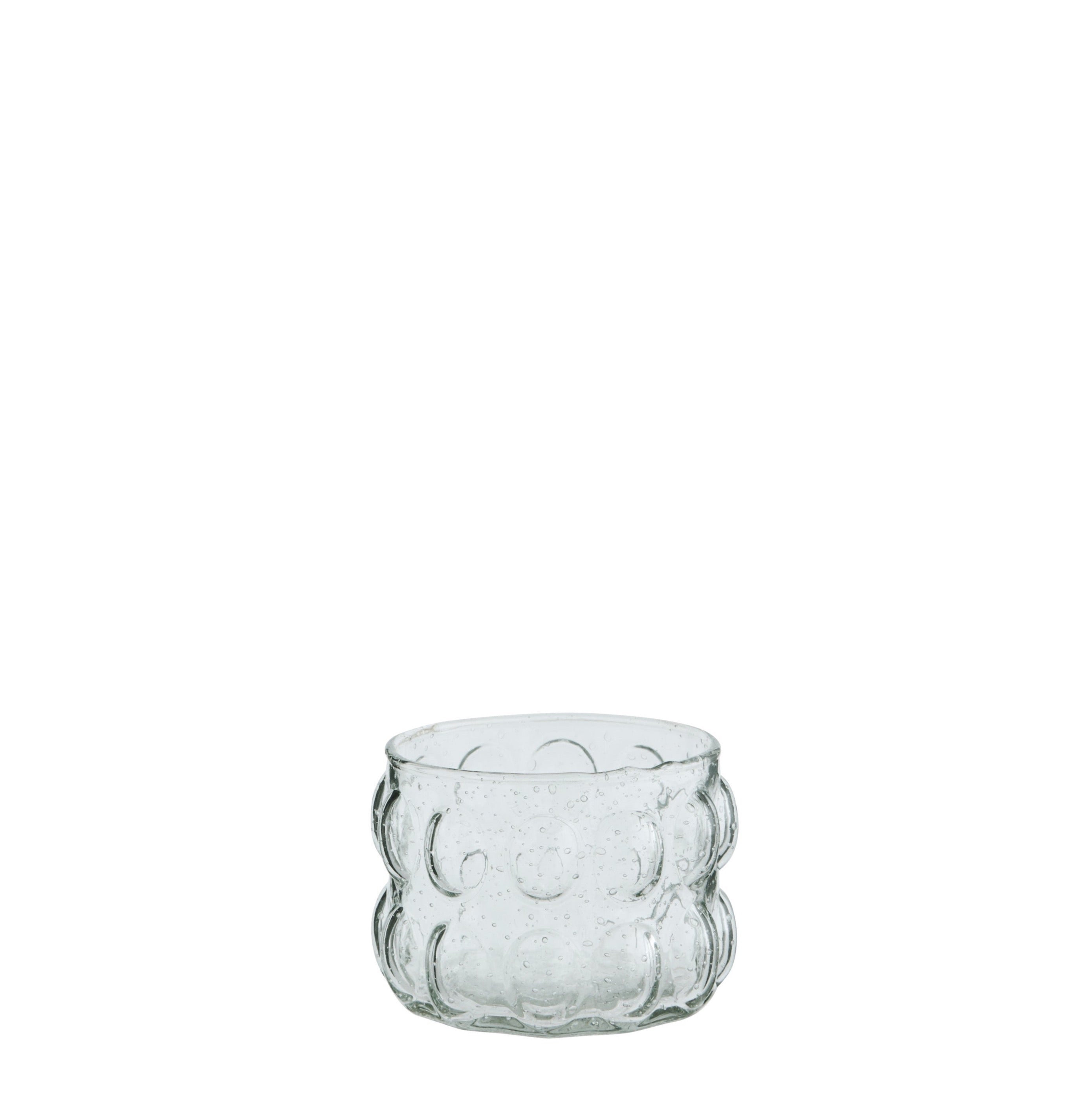 Glass votive with a bubble texture to the glass and two rows of raised oval bumps around the outside.